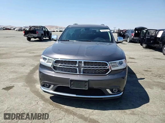 2015 Dodge Durango SXT with VIN 1C4RDHAG4FC127816, listed as a Copart auction lot 64864055 with 134,780 mi miles and Salvage title. Bid and sale history available at DreamBid. Image 14.
