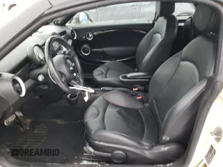 2013 MINI Coupe S z VIN WMWSX3C56DT772517, wystawiony jako Copart lot #83702084 z przebiegiem 106 910 mil mil oraz Tytuł czysty. Historia ofert i sprzedaży dostępna na DreamBid. Obrazek 7.