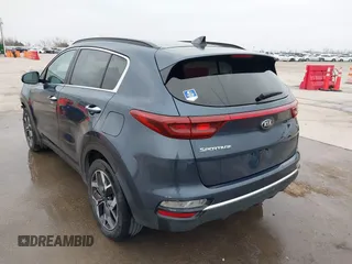 2021 Kia Sportage EX with VIN KNDPN3AC7M7920408, listed as a IAAI auction lot 41421579 with 70,921 mi miles and . Bid and sale history available at DreamBid. Image 3.
