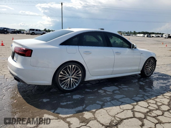 2016 Audi A6 Prestige with VIN WAUHGAFC5GN102023, listed as a Copart auction lot 57486715 with 122,807 mi miles and Salvage title. Bid and sale history available at DreamBid. Image 3.