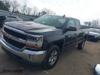 2016 Chevrolet Silverado 1500 LT with VIN 1GCRCREC0GZ232755, listed as a IAAI auction lot 41459604 with 131,600 mi miles. Bid and sale history available at carsss.com. Image 2.