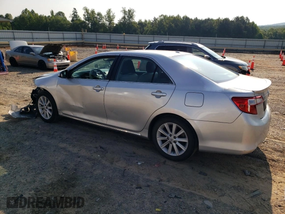 2012 Toyota Camry XLE z VIN 4T1BD1FKXCU007915, wystawiony jako Copart lot #60313605 z przebiegiem 186 574 mil mil oraz Szkoda całkowita • Salvage title. Historia ofert i sprzedaży dostępna na DreamBid. Obrazek 2.