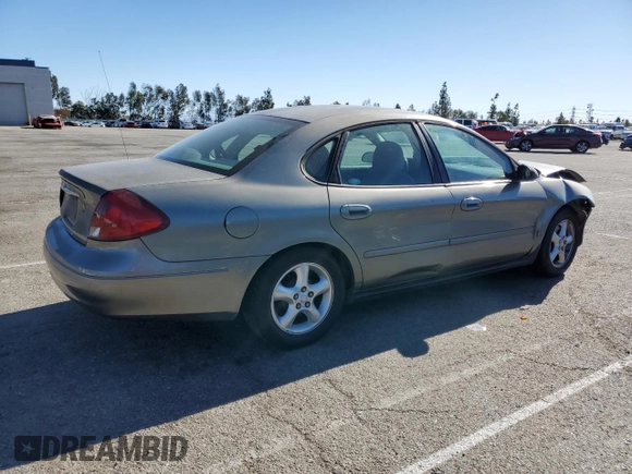 2001 Ford Taurus LX Standard z VIN 1FAFP52U51A138332, wystawiony jako Copart lot #88528355 z przebiegiem 166 511 mil mil oraz Szkoda całkowita • Salvage title. Historia ofert i sprzedaży dostępna na DreamBid. Obrazek 3.