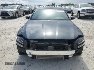 2023 Genesis G70 2.0T with VIN KMTG34TA4PU120566, listed as a Copart auction lot 53307455 with 31,933 mi miles and Salvage title. Bid and sale history available at DreamBid. Image 5.
