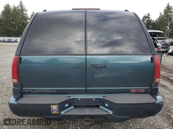 1999 GMC Denali z VIN 1GKEK13R6XR918944, wystawiony jako Copart lot #46049675 z przebiegiem 140 826 mil mil oraz Tytuł czysty. Historia ofert i sprzedaży dostępna na DreamBid. Obrazek 6.