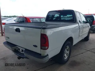 2003 Ford F-150 XL with VIN 1FTRX17L23NA85083, listed as a IAAI auction lot 42534913 with 192,195 mi miles and . Bid and sale history available at DreamBid. Image 4.