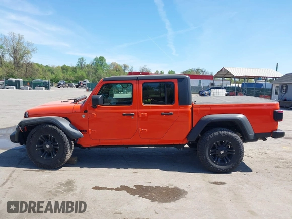 2020 Jeep Gladiator Sport S z VIN 1C6HJTAG0LL149161, wystawiony jako IAAI lot #42071132 z przebiegiem 153 062 mil mil oraz . Historia ofert i sprzedaży dostępna na DreamBid. Obrazek 14.