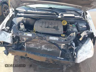 2020 Dodge Grand Caravan SE with VIN 2C4RDGBG1LR237363, listed as a IAAI auction lot 40096749 with 120,742 mi miles and . Bid and sale history available at DreamBid. Image 10.