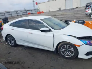 2017 Honda Civic Sedan LX with VIN 19XFC2F54HE039967, listed as a IAAI auction lot 41951897 with 106,660 mi miles. Bid and sale history available at carsss.com. Image 13.