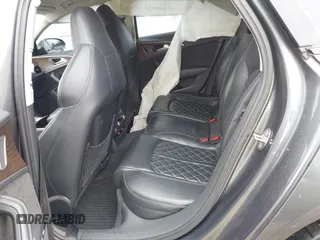 2016 Audi S6 Prestige z VIN WAUH2AFC1GN016187, wystawiony jako IAAI lot #42274744 z przebiegiem 169 821 mil mil oraz . Historia ofert i sprzedaży dostępna na DreamBid. Obrazek 8.