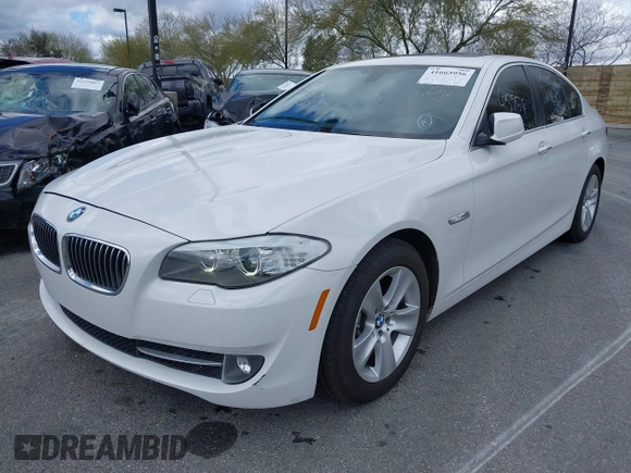 2013 BMW 5 Series 528i with VIN WBAXG5C50DDY34618, listed as a IAAI auction lot 41665956 with 85,088 mi miles and . Bid and sale history available at carsss.com. Image 2.