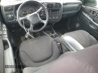 2003 GMC Sonoma SLS z VIN 1GTCT19X938201721, wystawiony jako Copart lot #56011695 z przebiegiem Nie podano mil oraz Nie do naprawy. Historia ofert i sprzedaży dostępna na DreamBid. Obrazek 8.