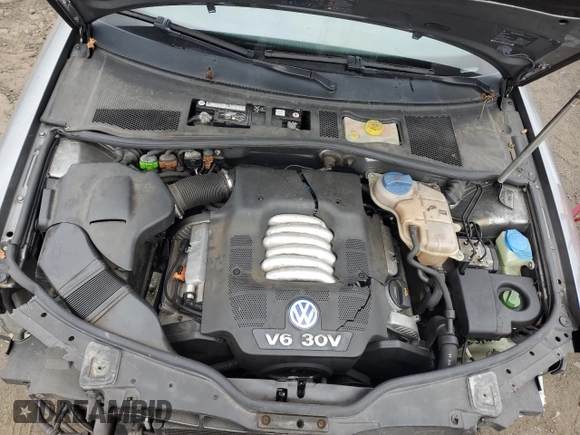 2003 Volkswagen Passat GLX z VIN WVWRH63B73P271889, wystawiony jako Copart lot #57166465 z przebiegiem 56 457 mil mil oraz Szkoda całkowita • Salvage title. Historia ofert i sprzedaży dostępna na DreamBid. Obrazek 11.