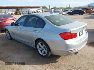 2015 BMW 3 Series 328i with VIN WBA3A5C58FF610035, listed as a IAAI auction lot 40986949 with 73,083 mi miles. Bid and sale history available at carsss.com. Image 3.