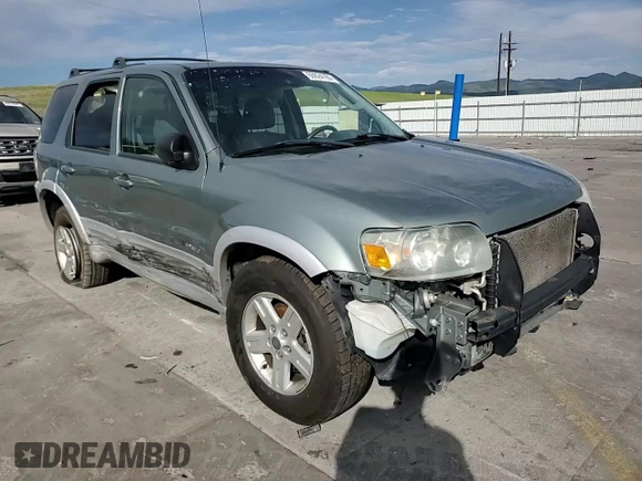 2005 Ford Escape Hybrid z VIN 1FMCU95HX5KE24619, wystawiony jako Copart lot #60624765 z przebiegiem 209 937 mil mil oraz Nie do naprawy • Non repairable. Historia ofert i sprzedaży dostępna na DreamBid. Obrazek 14.