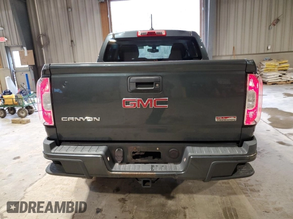 2015 GMC Canyon 4WD SLE with VIN 1GTG6BE37F1118335, listed as a Copart auction lot 85271264 with 58,679 mi miles and Salvage Title. Bid and sale history available at carsss.com. Image 6.