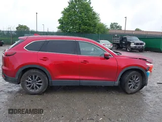 2022 Mazda CX-9 Touring with VIN JM3TCBCY9N0613508, listed as a IAAI auction lot 42258870 with 46,911 mi miles and . Bid and sale history available at DreamBid. Image 14.