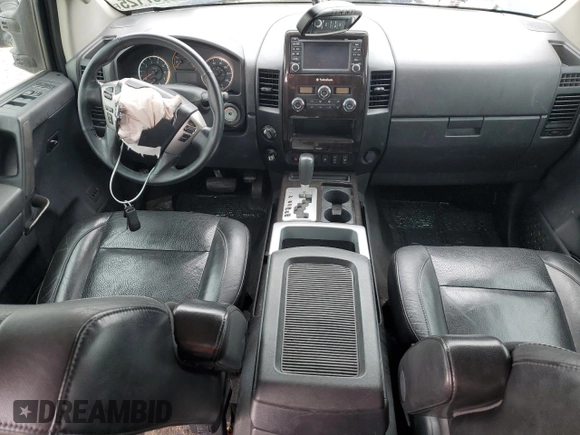 2013 Nissan Titan Pro-4X with VIN 1N6BA0ECXDN313300, listed as a Copart auction lot 46987125 with 174,432 mi miles and Salvage title. Bid and sale history available at DreamBid. Image 8.