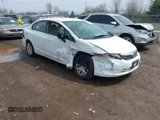 2012 Honda Civic LX z VIN 19XFB2F58CE038090, wystawiony jako IAAI lot #41931673 z przebiegiem 100 404 mil mil oraz . Historia ofert i sprzedaży dostępna na DreamBid. Obrazek 1.