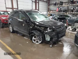 2013 Ford Escape SE with VIN 1FMCU9GX6DUC07446, listed as a IAAI auction lot 41089866 with 119,018 mi miles. Bid and sale history available at carsss.com. Image 1.