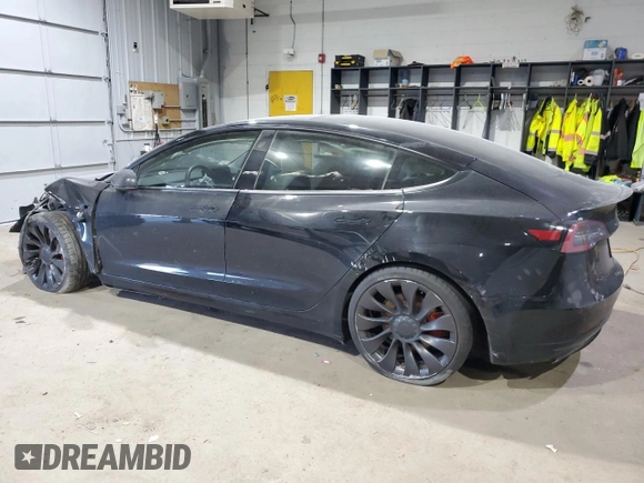 2022 Tesla Model 3 Performance with VIN 5YJ3E1EC7NF104209, listed as a Copart auction lot 86266344 with 77,335 mi miles and Salvage Title. Bid and sale history available at DreamBid. Image 2.
