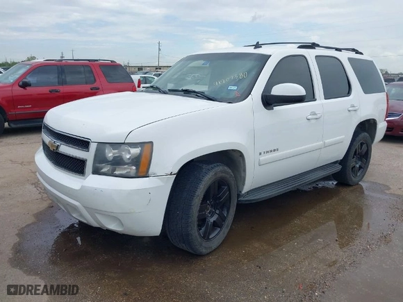 2007 Chevrolet Tahoe LT with VIN 1GNFK13027R190080, listed as a IAAI auction lot 41907380 with 189,206 mi miles. Bid and sale history available at carsss.com. Image 2.