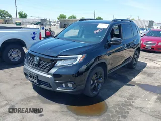 2021 Honda Passport Elite with VIN 5FNYF8H07MB003506, listed as a IAAI auction lot 42571906 with 42,323 mi miles and . Bid and sale history available at DreamBid. Image 18.
