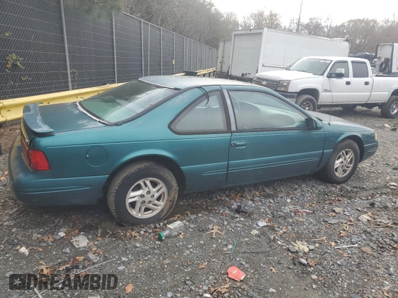 1997 Ford Thunderbird LX with VIN 1FALP6245VH171563, listed as a Copart auction lot 81970734 with 67,304 mi miles and Clean Title. Bid and sale history available at DreamBid. Image 3.