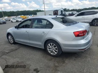 2015 Volkswagen Jetta SE z VIN 3VWD17AJ4FM417218, wystawiony jako Copart lot #61001125 z przebiegiem 84 159 mil mil oraz Szkoda całkowita • Salvage title. Historia ofert i sprzedaży dostępna na DreamBid. Obrazek 2.