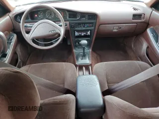1990 Nissan Maxima z VIN JN1HJ01P3LT393901, wystawiony jako Copart lot #79912694 z przebiegiem 127 678 mil mil oraz Szkody całkowita. Historia ofert i sprzedaży dostępna na DreamBid. Obrazek 8.