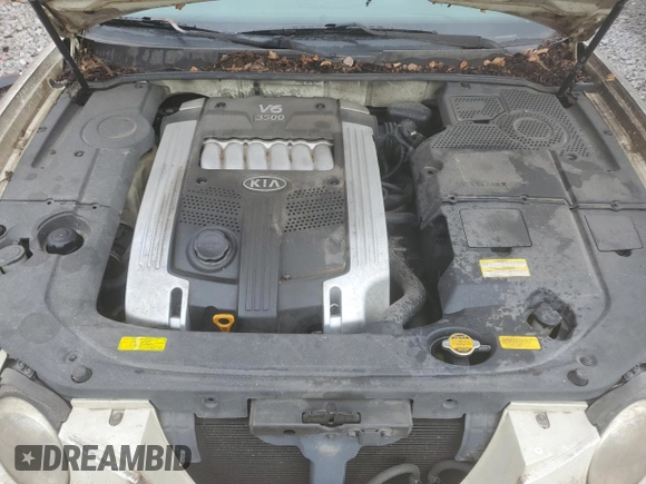 2004 Kia Amanti z VIN KNALD124645042962, wystawiony jako Copart lot #78897374 z przebiegiem 182 054 mil mil oraz Tytuł czysty. Historia ofert i sprzedaży dostępna na DreamBid. Obrazek 11.