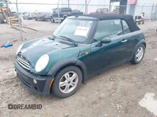 2005 MINI Convertible with VIN WMWRF33495TG11818, listed as a IAAI auction lot 42351446 with 100,033 mi miles and . Bid and sale history available at DreamBid. Image 2.