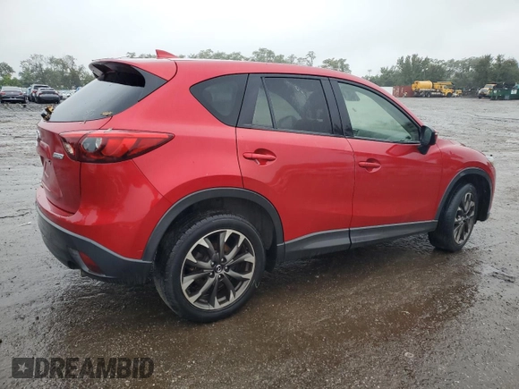 2016 Mazda CX-5 Grand Touring with VIN JM3KE4DY3G0713283, listed as a Copart auction lot 73346194 with 135,382 mi miles and Salvage Title. Bid and sale history available at carsss.com. Image 3.