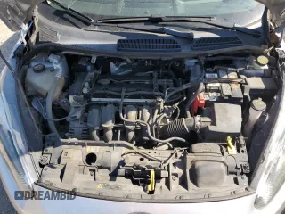 2019 Ford Fiesta SE z VIN 3FADP4BJXKM123806, wystawiony jako Copart lot #53184825 z przebiegiem 141 759 mil mil oraz Szkoda całkowita • Salvage title. Historia ofert i sprzedaży dostępna na DreamBid. Obrazek 13.