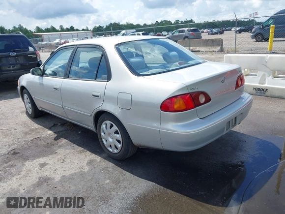 2002 Toyota Corolla CE with VIN 1NXBR12E12Z581660, listed as a IAAI auction lot 42654124 with 115,950 mi miles and . Bid and sale history available at DreamBid. Image 3.