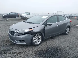 2014 Kia Forte EX with VIN KNAFX4A8XE5213014, listed as a IAAI auction lot 41000589 with 89,890 mi miles. Bid and sale history available at carsss.com. Image 2.