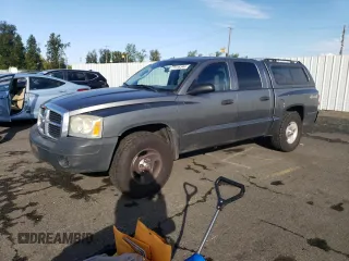 2006 Dodge Dakota ST with VIN 1D7HW28K96S716210, listed as a Copart auction lot 77416344 with 115,973 mi miles and Salvage Title. Bid and sale history available at carsss.com. Image 1.