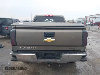 2015 Chevrolet Silverado 1500 LT with VIN 1GCVKREC9FZ237338, listed as a IAAI auction lot 41897225 with 154,229 mi miles and . Bid and sale history available at DreamBid. Image 16.