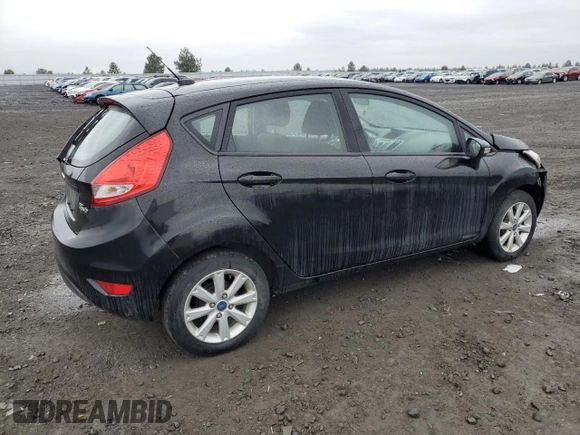 2013 Ford Fiesta SE with VIN 3FADP4EJ5DM119614, listed as a Copart auction lot 48731575 with 64,676 mi miles and Salvage Title. Bid and sale history available at carsss.com. Image 3.