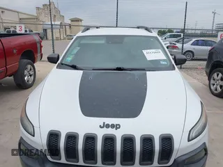 2015 Jeep Cherokee Trailhawk with VIN 1C4PJMBS9FW623740, listed as a IAAI auction lot 42131019 with 155,105 mi miles and . Bid and sale history available at DreamBid. Image 12.