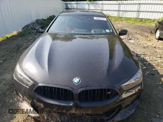 2023 BMW 8 Series M850i with VIN WBAGV8C09PCK80498, listed as a Copart auction lot 59668124 with 44,527 mi miles and Salvage Title. Bid and sale history available at carsss.com. Image 5.