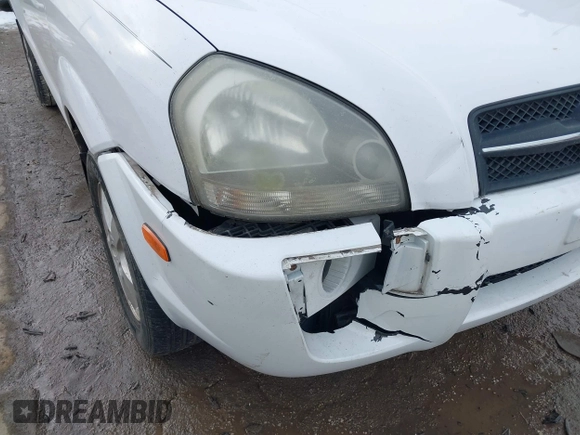 2006 Hyundai Tucson GL with VIN KM8JM12BX6U467288, listed as a IAAI auction lot 41679827 with 146,973 mi miles. Bid and sale history available at carsss.com. Image 6.