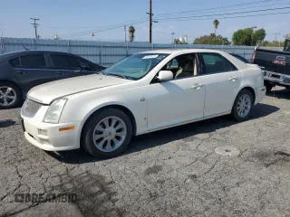 2006 Cadillac STS z VIN 1G6DW677560132284, wystawiony jako Copart lot #55707415 z przebiegiem 329 037 mil mil oraz Czysty tytuł • Clean title. Historia ofert i sprzedaży dostępna na DreamBid. Obrazek 1.