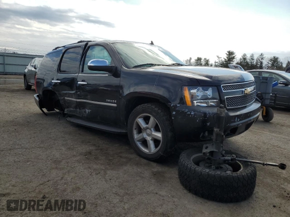 2012 Chevrolet Tahoe LTZ with VIN 1GNSKCE08CR322969, listed as a Copart auction lot 50604555 with 165,190 mi miles and Salvage title. Bid and sale history available at DreamBid. Image 4.