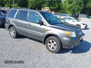 2007 Honda Pilot EX-L with VIN 2HKYF18537H513425, listed as a IAAI auction lot 42624215 with 154,505 mi miles and . Bid and sale history available at DreamBid. Image 1.