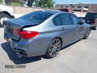 2019 BMW 5 Series 540i with VIN WBAJE5C55KWW11827, listed as a IAAI auction lot 42191127 with 72,113 mi miles and . Bid and sale history available at DreamBid. Image 4.