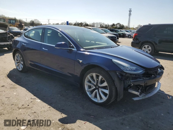 2019 Tesla Model 3 Mid Range with VIN 5YJ3E1EA6KF412837, listed as a Copart auction lot 50871195 with 39,570 mi miles and Salvage Title. Bid and sale history available at DreamBid. Image 4.