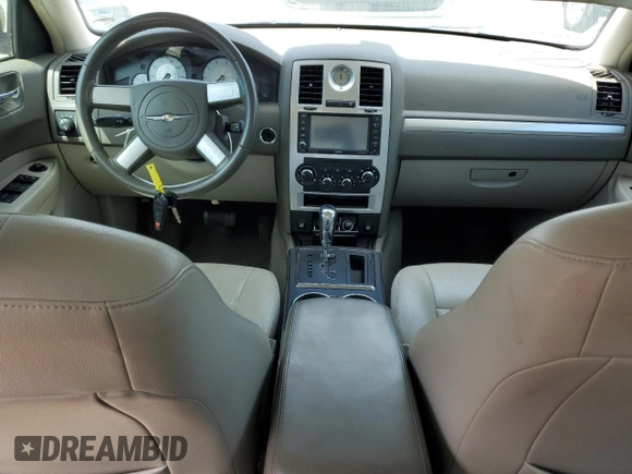 2009 Chrysler 300 Touring with VIN 2C3KA53V69H592639, listed as a Copart auction lot 55209775 with 107,751 mi miles and Salvage Title. Bid and sale history available at DreamBid. Image 8.