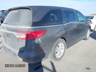2019 Honda Odyssey LX with VIN 5FNRL6H21KB057139, listed as a IAAI auction lot 41422185 with 128,812 mi miles and . Bid and sale history available at DreamBid. Image 4.