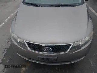2011 Kia Forte EX with VIN KNAFU4A25B5441194, listed as a IAAI auction lot 42076839 with 91,706 mi miles. Bid and sale history available at carsss.com. Image 6.